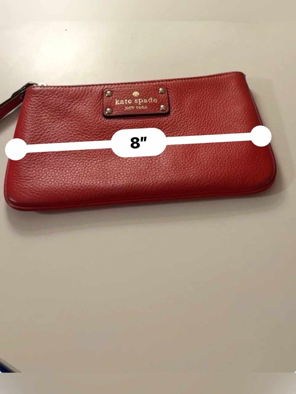 kate spade Red Pebbled Leather Wristlet with Gold Hardware